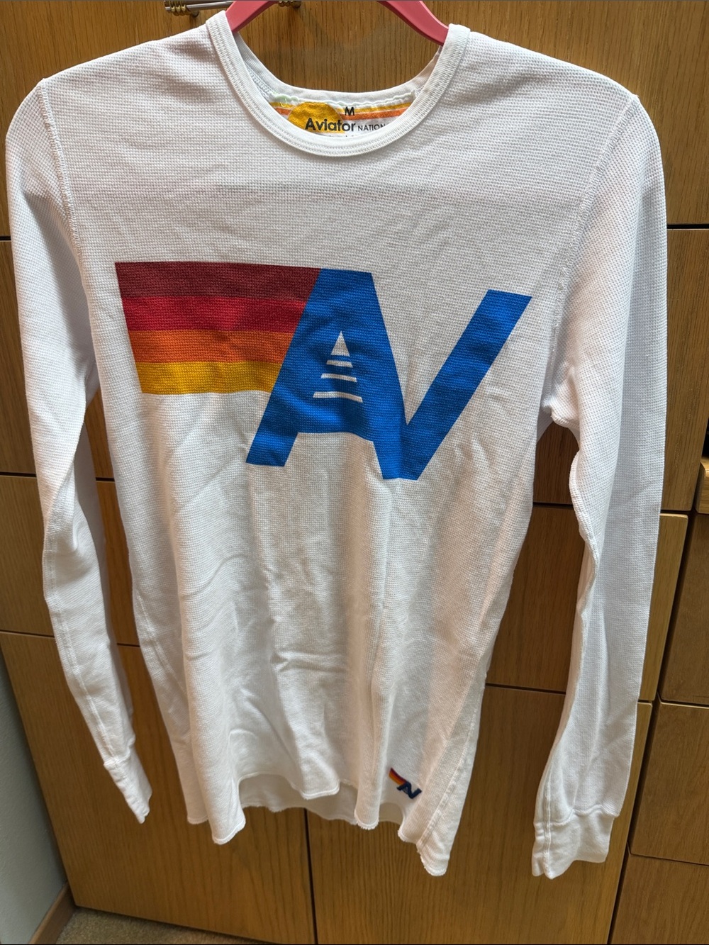 Aviator Nation White Long Sleeve Tee with Blue AV and Red/Orange/Yellow Stripes